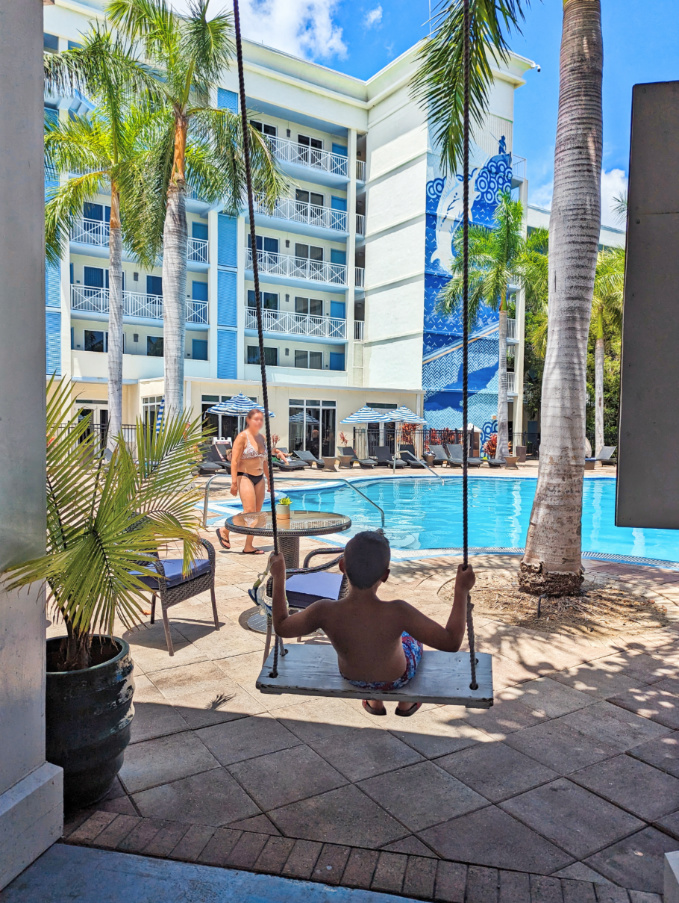 Taylor Family on swings by the pool at 24 North Hotel Key West Florida Keys 2