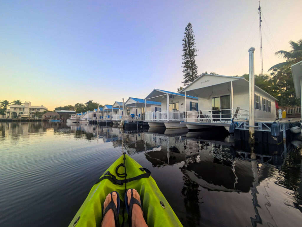Kayaking by Row of Aqualodges at Treasure Harbor Resort Houseboats Islamorada Florida Keys 5
